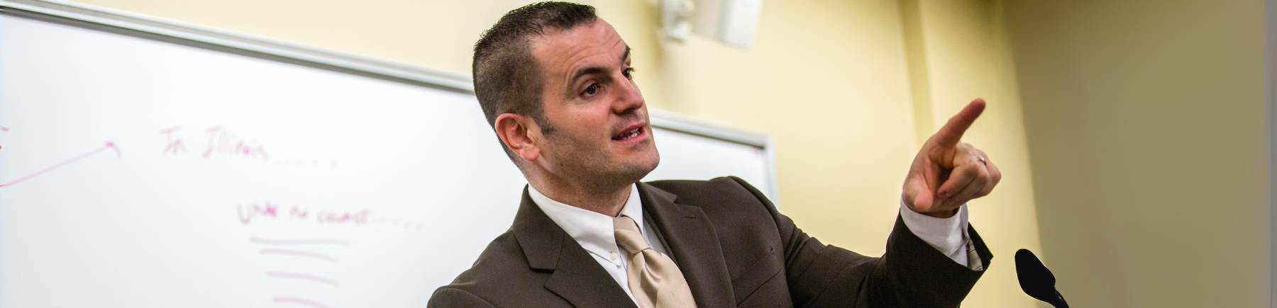 A Loyola SCPS Paralegal program instructor teaches a class of students. A Loyola SCPS Paralegal program instructor teaches a class of students.